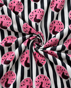 Full repeating pink peacock pattern against bold black and white vertical stripes