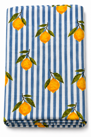 Gray and white striped lemon print fabric with yellow citrus and green leaves