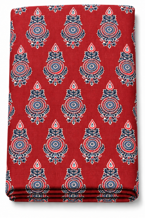 Red fabric with repeating blue and white floral medallion print