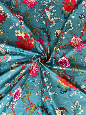 Teal cotton fabric with red pink and blue flowers
