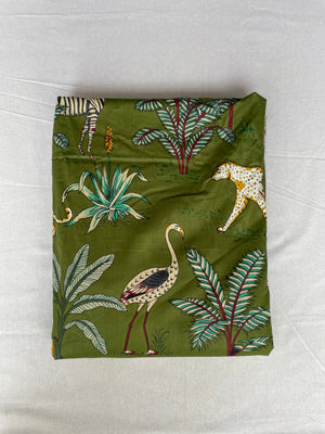 Zebra leopard and bird printed green cotton fabric