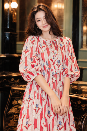 Red printed maxi dress with voluminous puff sleeves