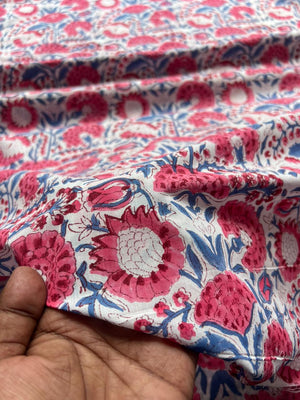 Cream fabric with red and burgundy floral motifs