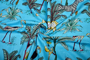 Turquoise wildlife print fabric for sewing projects