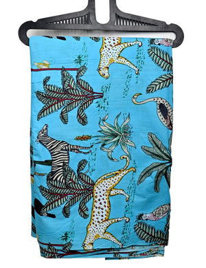 Turquoise fabric with zebra and big cat print