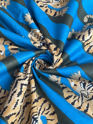 Golden tiger print fabric with blue stripes