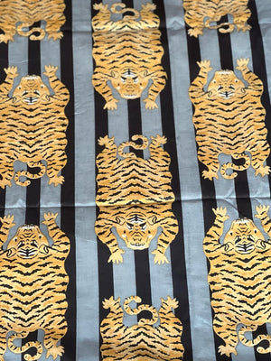 Golden brown tiger print cotton fabric
