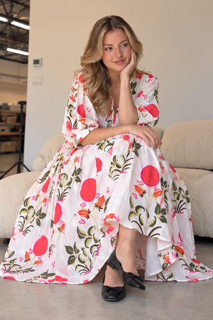 White botanical print maxi dress with flowing gathered skirt