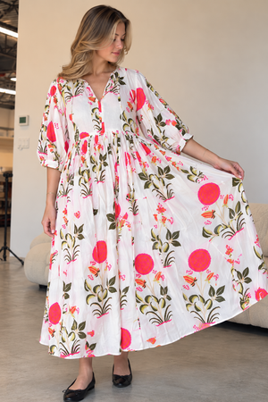 Women's white floral maxi dress with pink and olive green botanical print