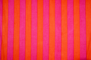 Bright pink orange striped cotton fabric