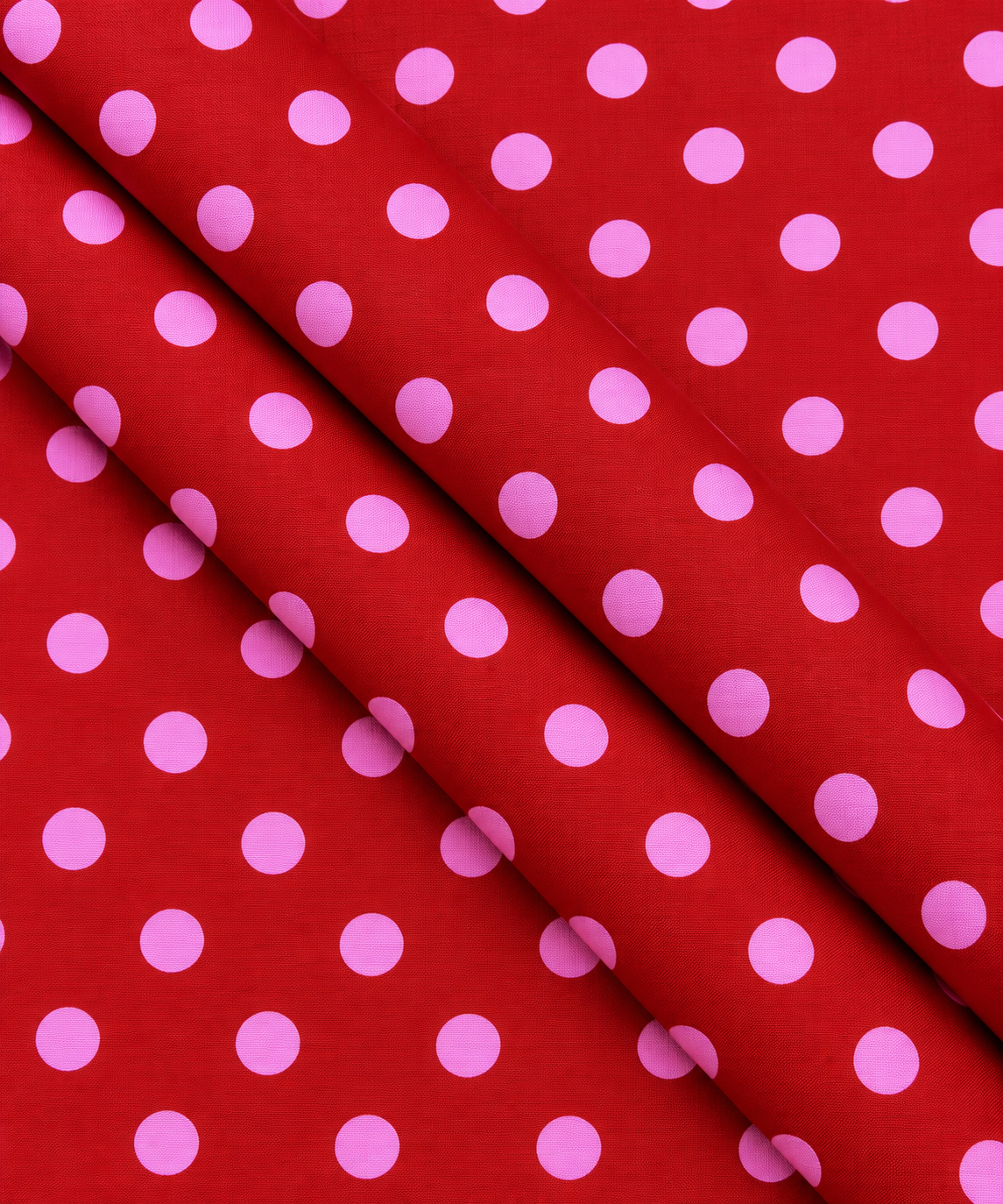 Red fabric with evenly spaced pink dots