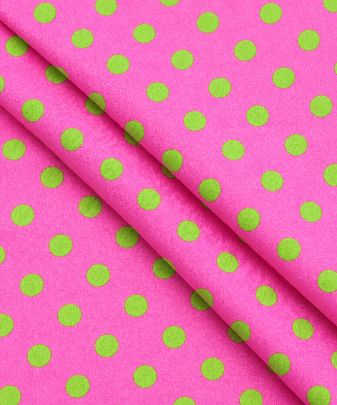 Pink fabric with evenly spaced green dots