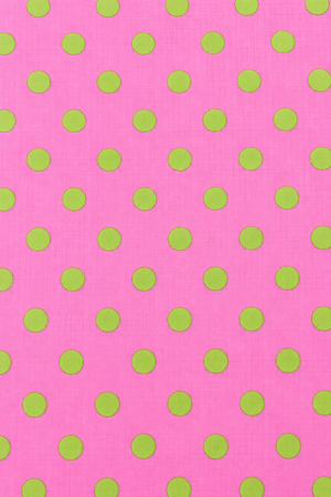 Pink printed dress material with green dots