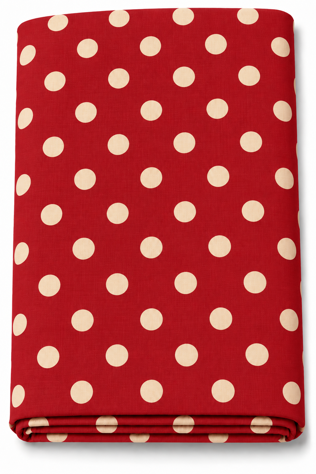 Folded maroon fabric with cream polka dots displayed on a green textured background