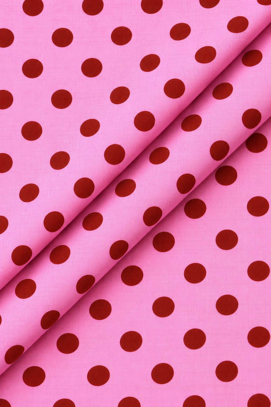 Pink and red polka dot fabric material for sewing and dressmaking