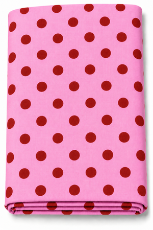 Bright pink fabric with dark red polka dot print and woven texture