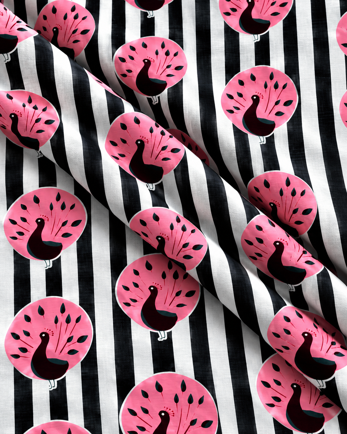 Printed cotton textile with black white stripes and pink peacock motifs showing fabric texture