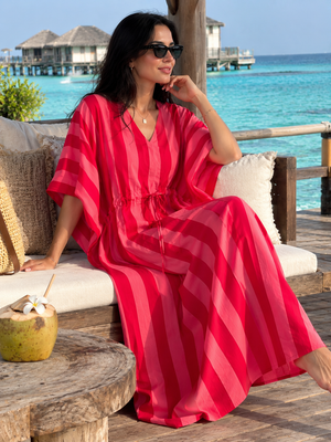 Lightweight pink cotton vacation dress with adjustable waist tie