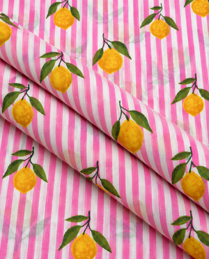 Lemon and green leaf print on pink and white striped fabric