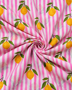 Colorful citrus print fabric with yellow lemons and pink vertical stripes
