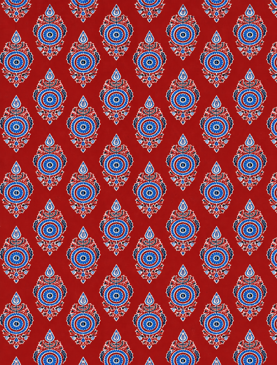 Red and blue Indian-inspired floral print fabric for sewing projects
