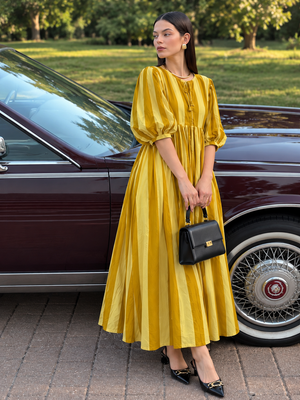 Women's elegant yellow maxi dress with a relaxed gathered silhouette