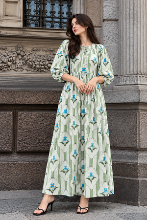 Flowing cream and green botanical print dress for women