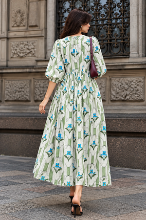 Women's long green floral dress with gathered waist