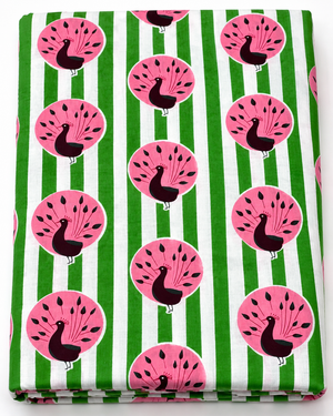 Pink peacock printed cotton fabric with green and white vertical stripes.