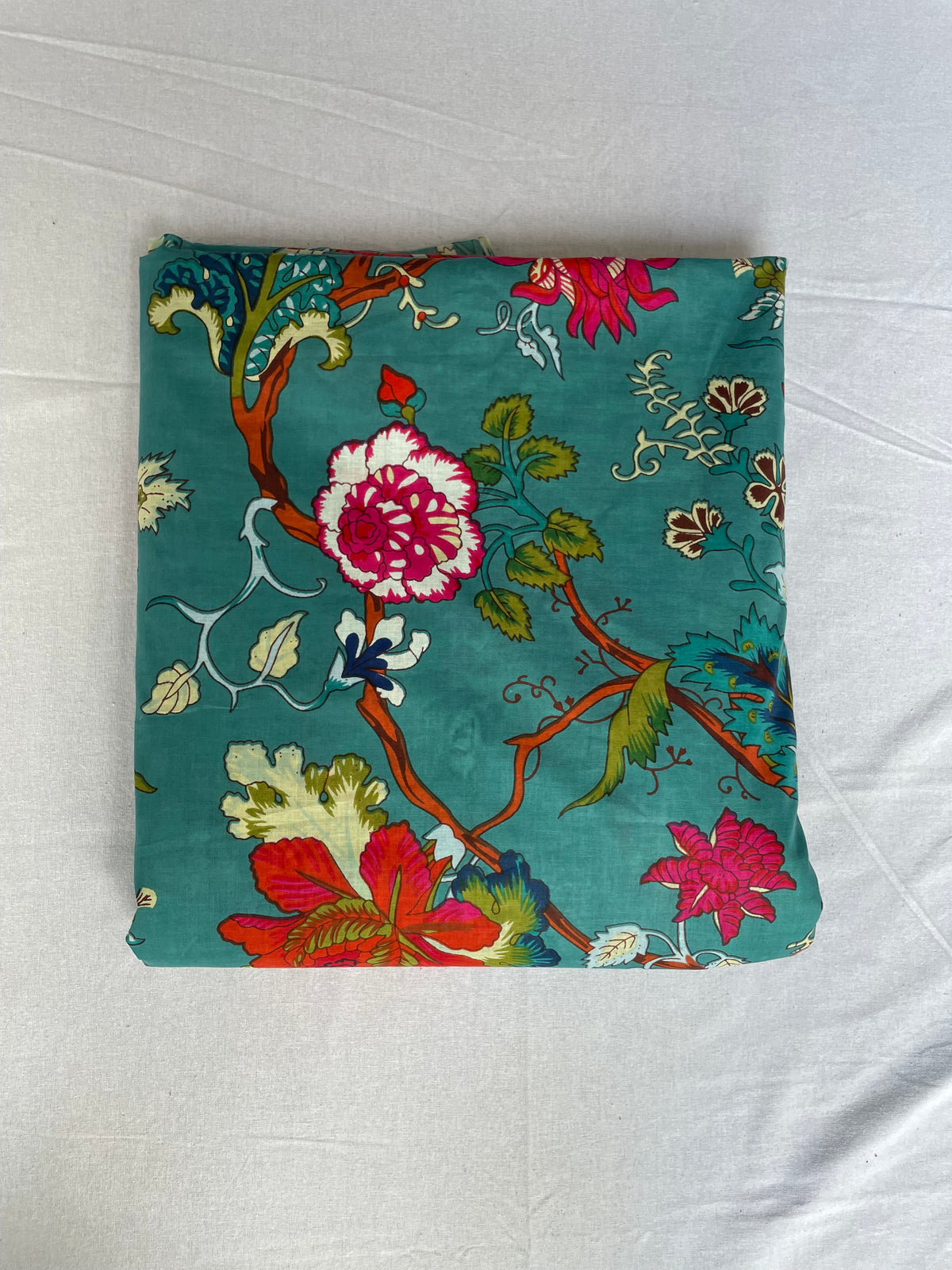 Teal botanical fabric for dresses and kaftans