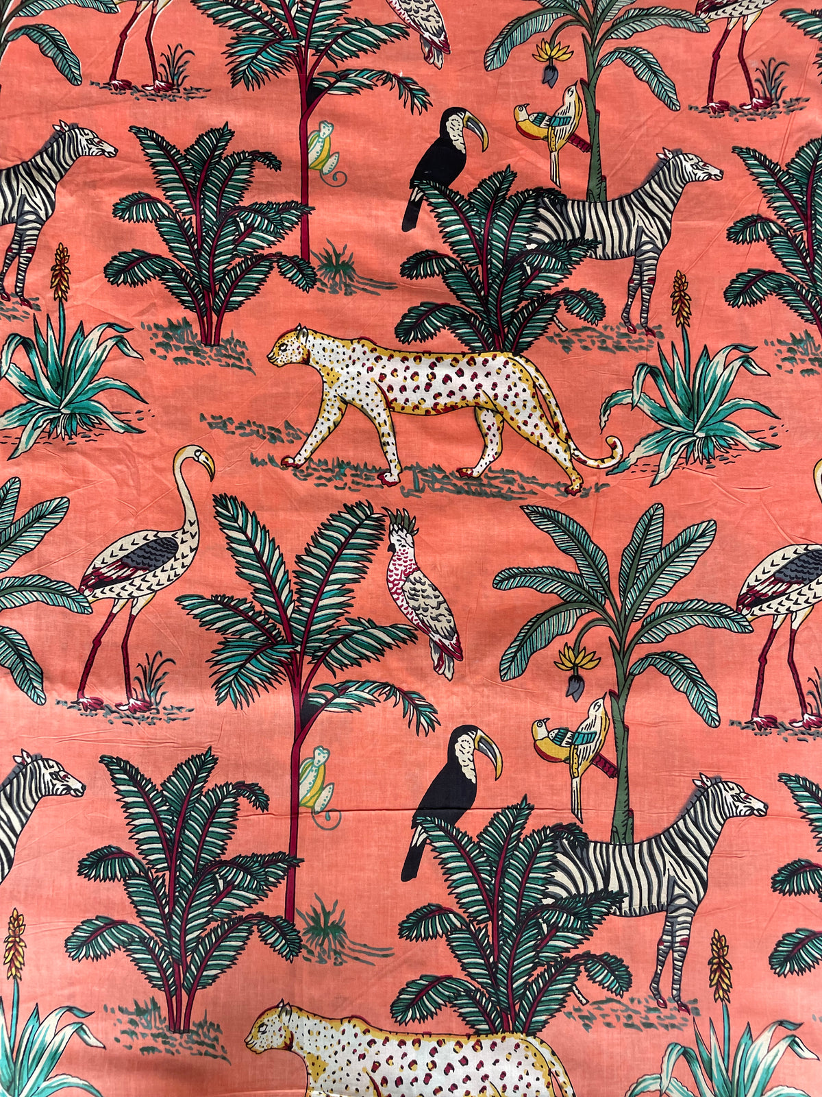 safari wildlife cotton fabric with tropical foliage