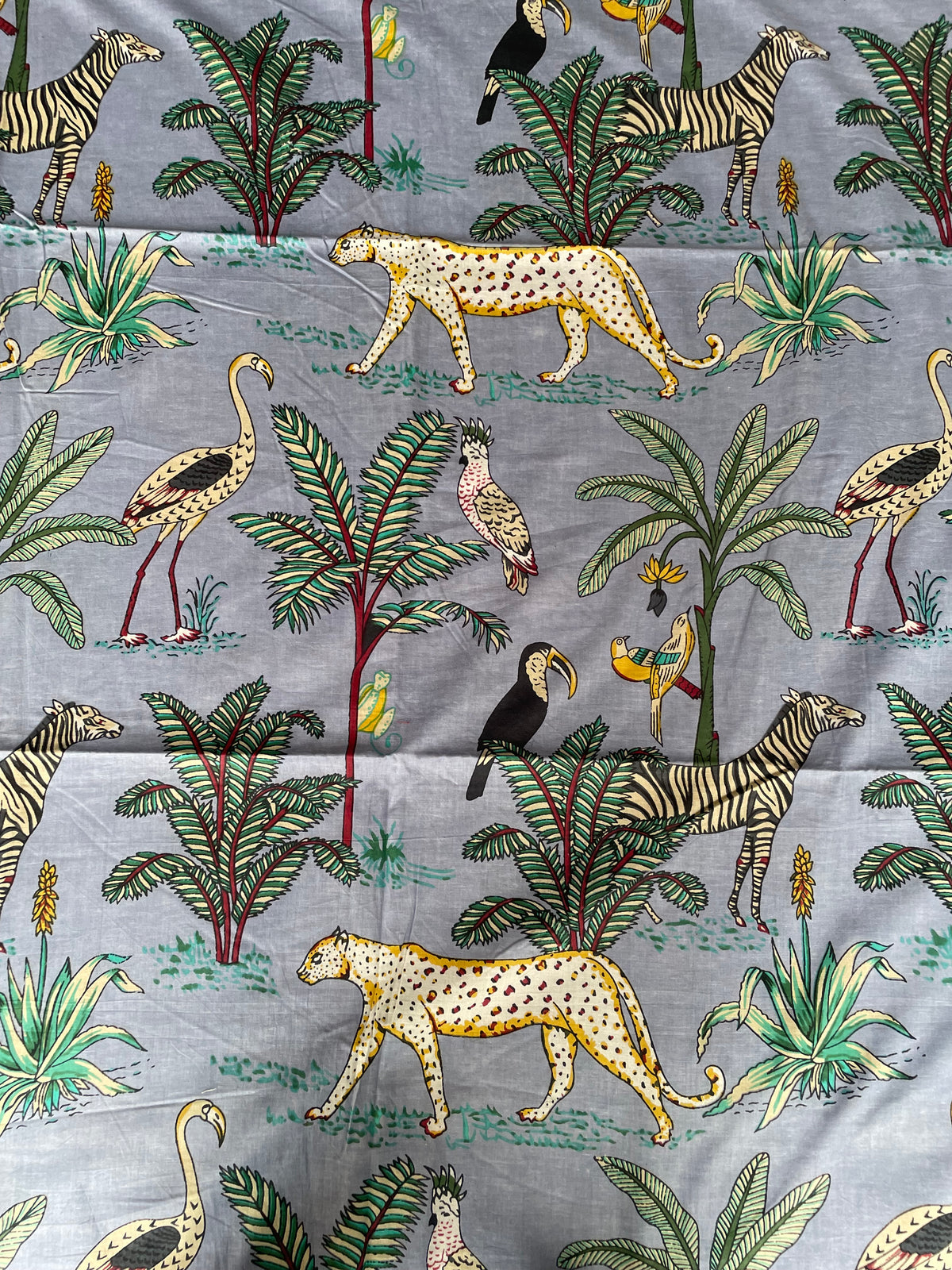 Tropical jungle animal fabric with exotic birds