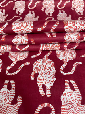Repeating tiger print cotton fabric for quilting