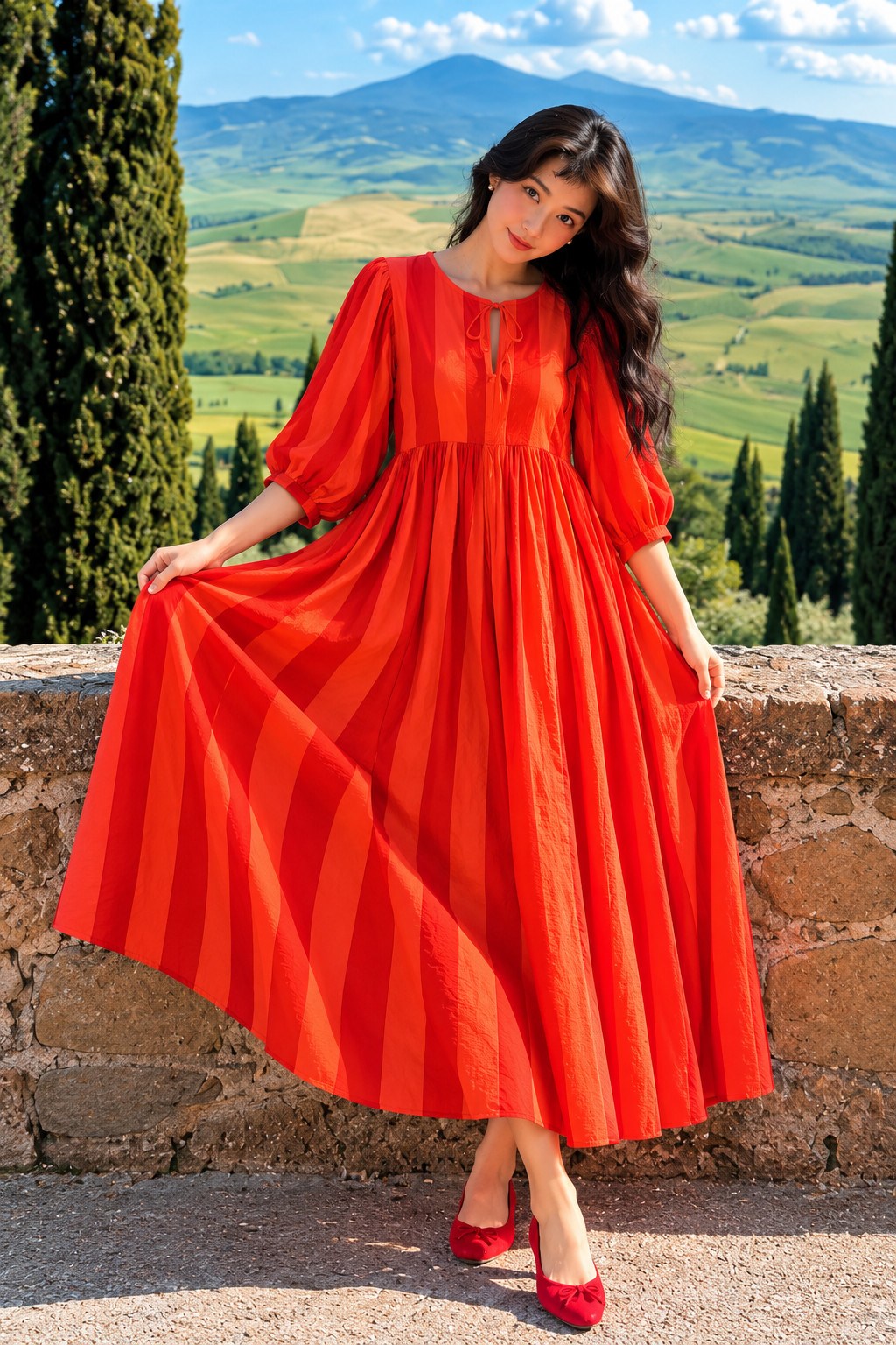 striped maxi dress with puff sleeves and flowing skirt