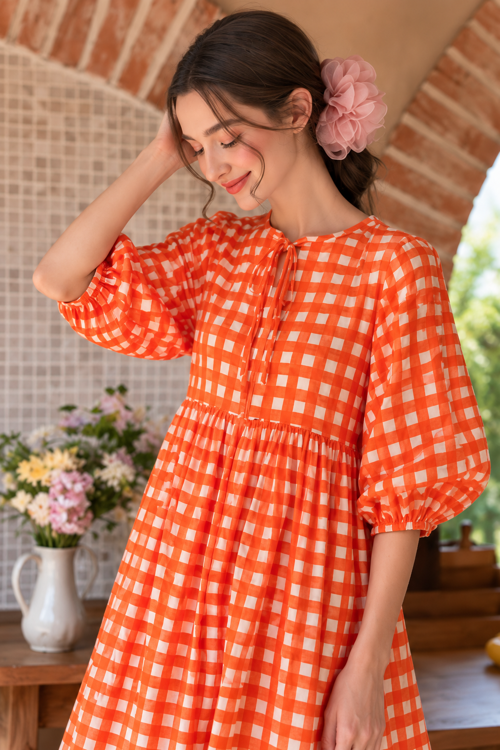 Women's orange check print dress with front tie neckline