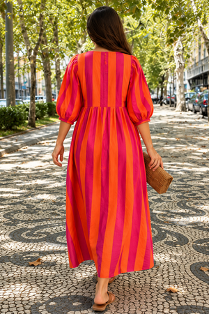 Full-length striped dress with gathered waist and tie neckline