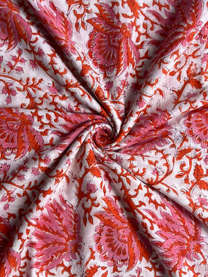Light pink fabric with detailed floral vine print