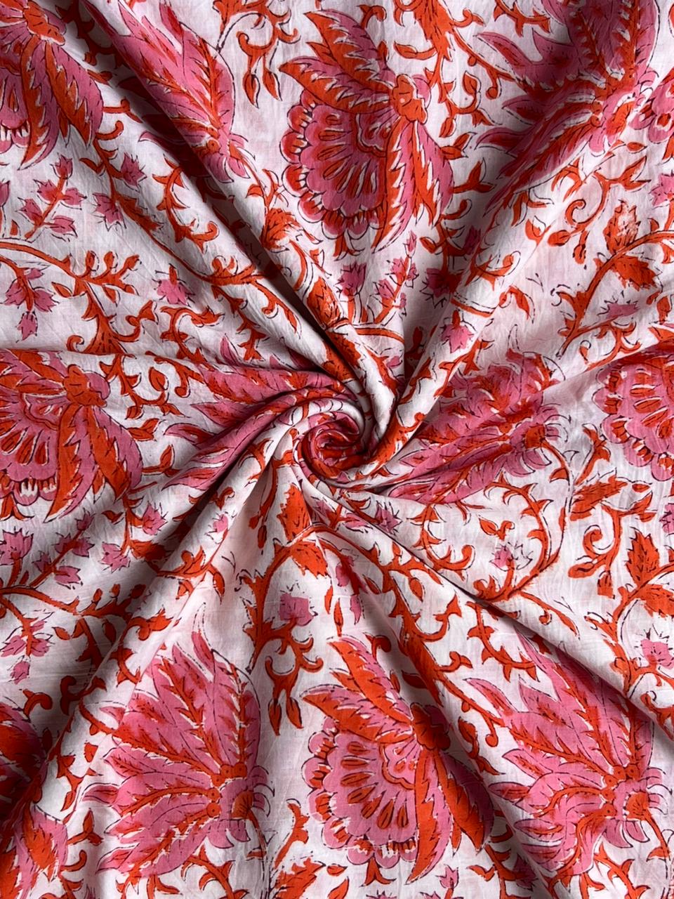 Light pink fabric with detailed floral vine print