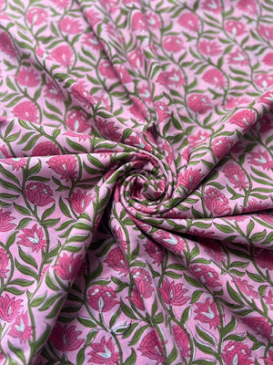 Light pink fabric with detailed floral print