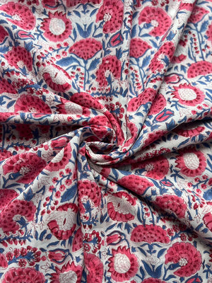 Red flower block print cotton fabric with navy leaves