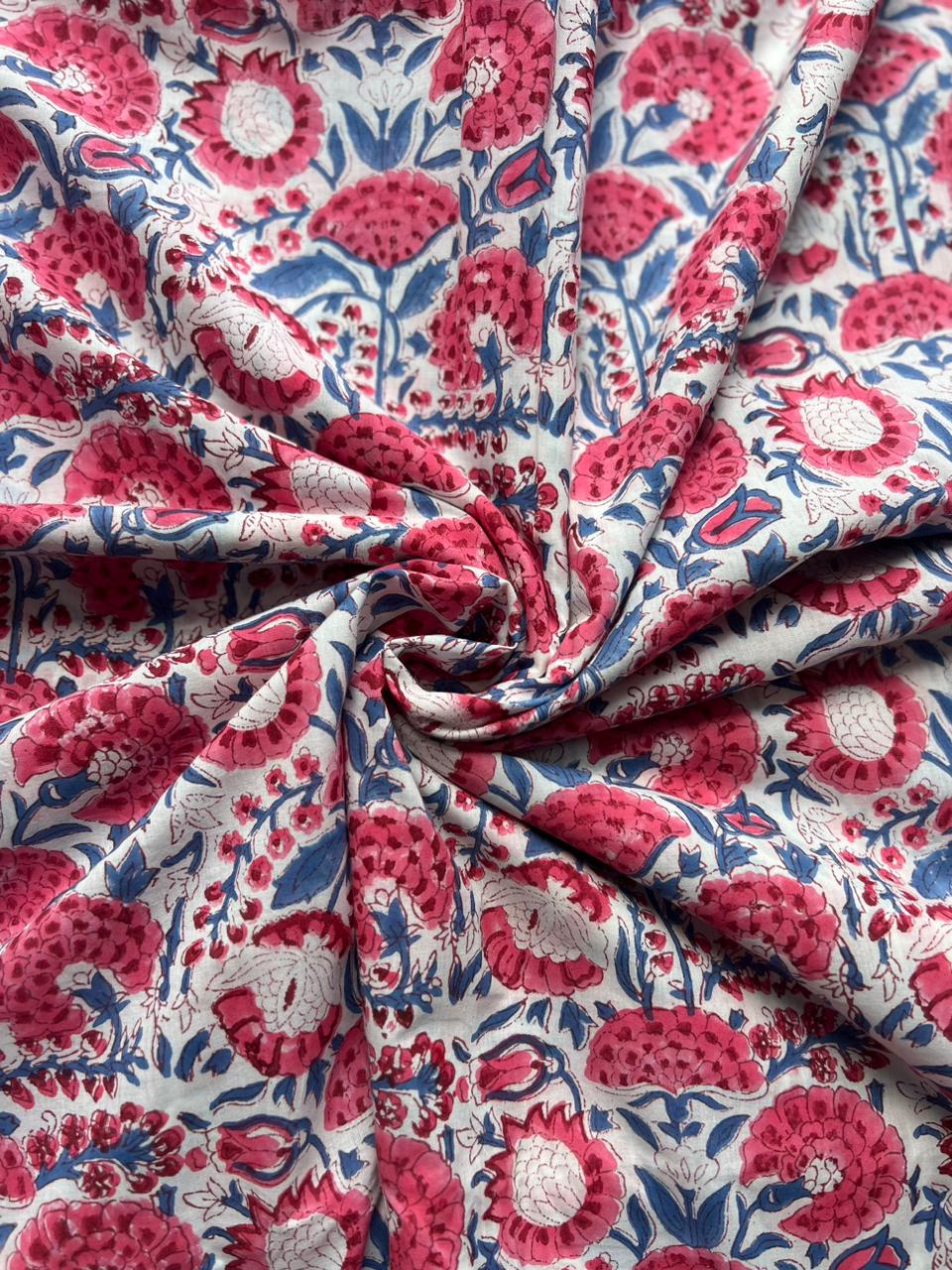 Red flower block print cotton fabric with navy leaves