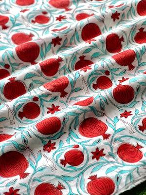 Cream cotton fabric with pomegranate block print
