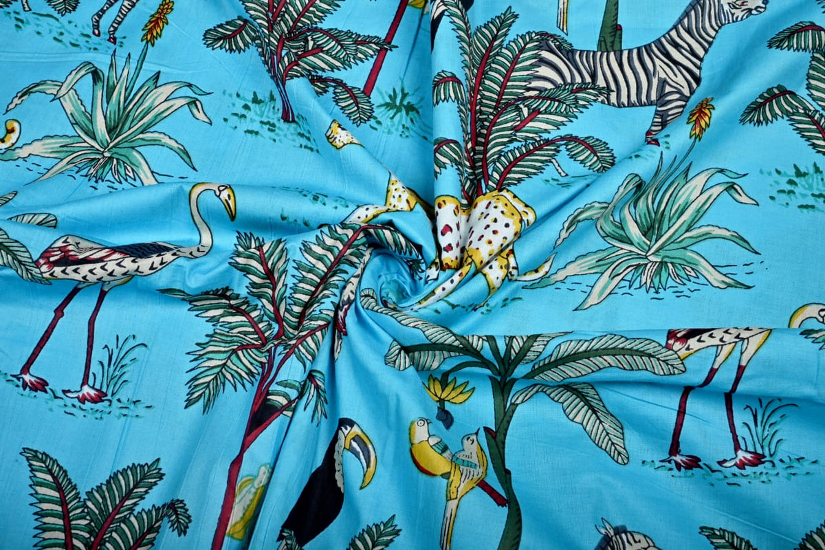 Turquoise wildlife print fabric for sewing projects