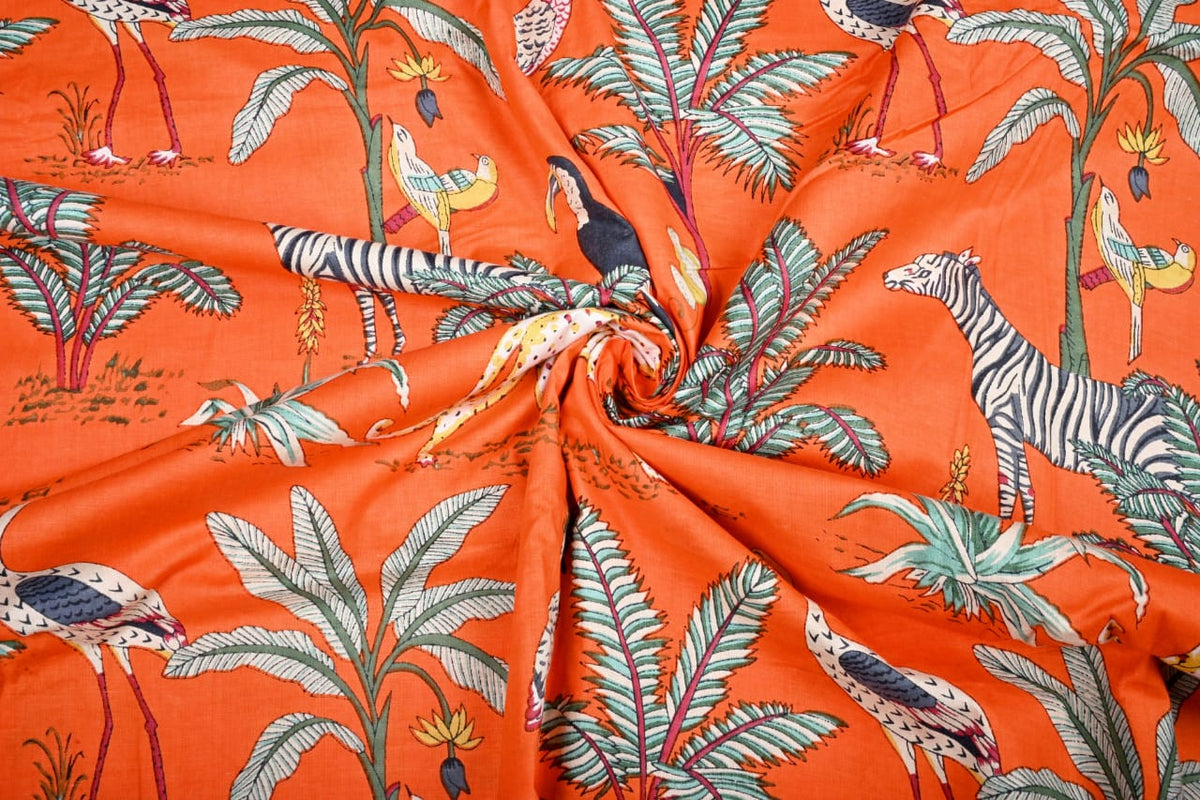 Orange wildlife print fabric for sewing projects