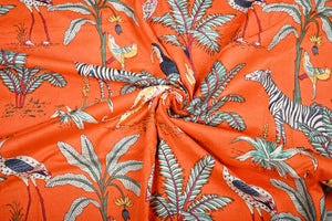 Orange wildlife print fabric for sewing projects