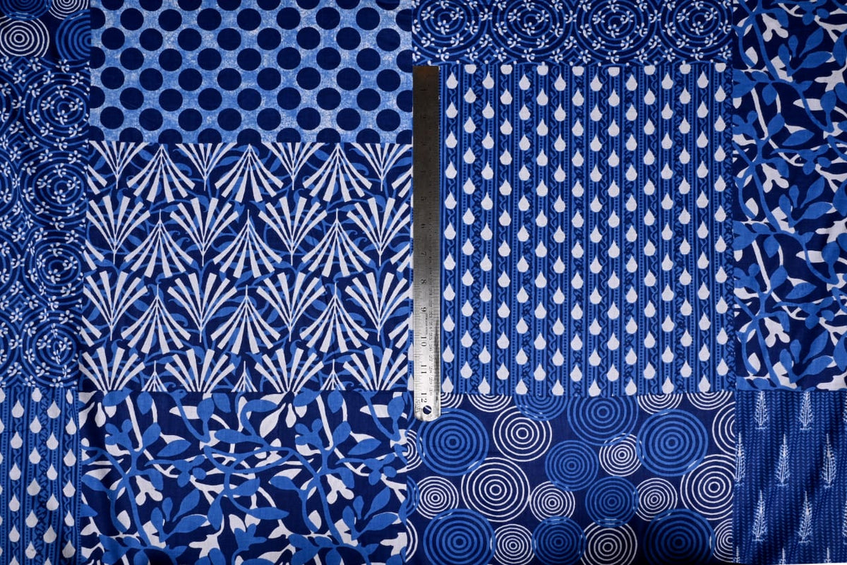 Blue abstract fabric with dots and circle motifs