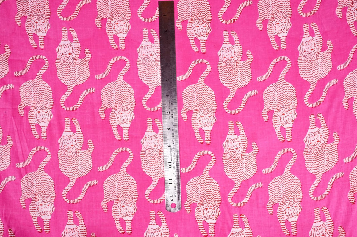 Pink and white Tibetan tiger patterned fabric