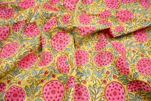 Yellow fabric with pink floral botanical print