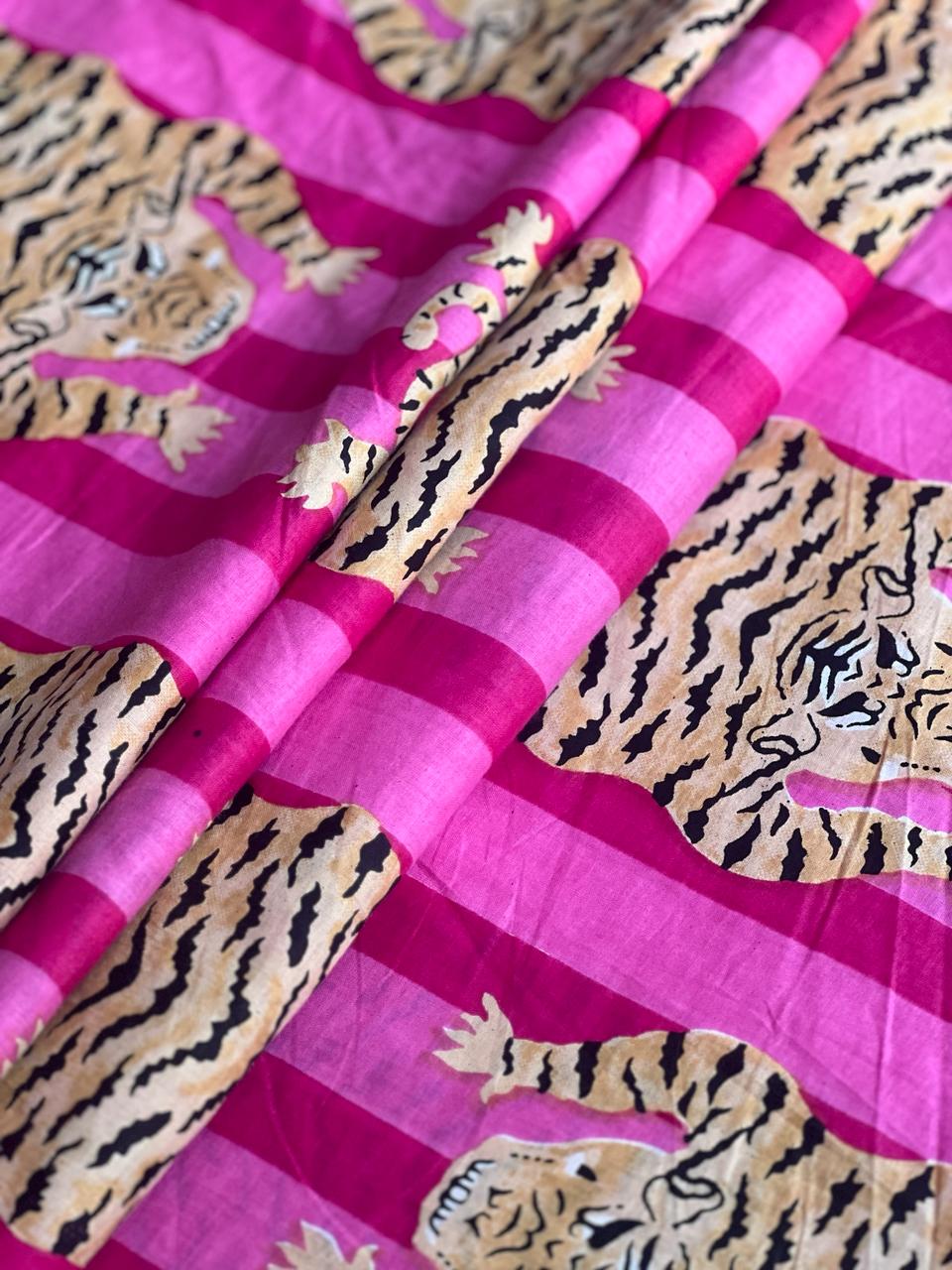 Golden tiger print fabric with pink stripes