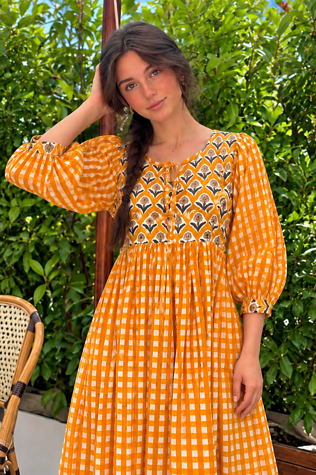 yellow checked maxi dress featuring three-quarter puff sleeves